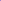 A close-up of Super Cheap Fabrics’ Soft Tulle - Purple - 150cm, partially unrolled on a white surface—ideal for creating lightweight projects like bridal veils.