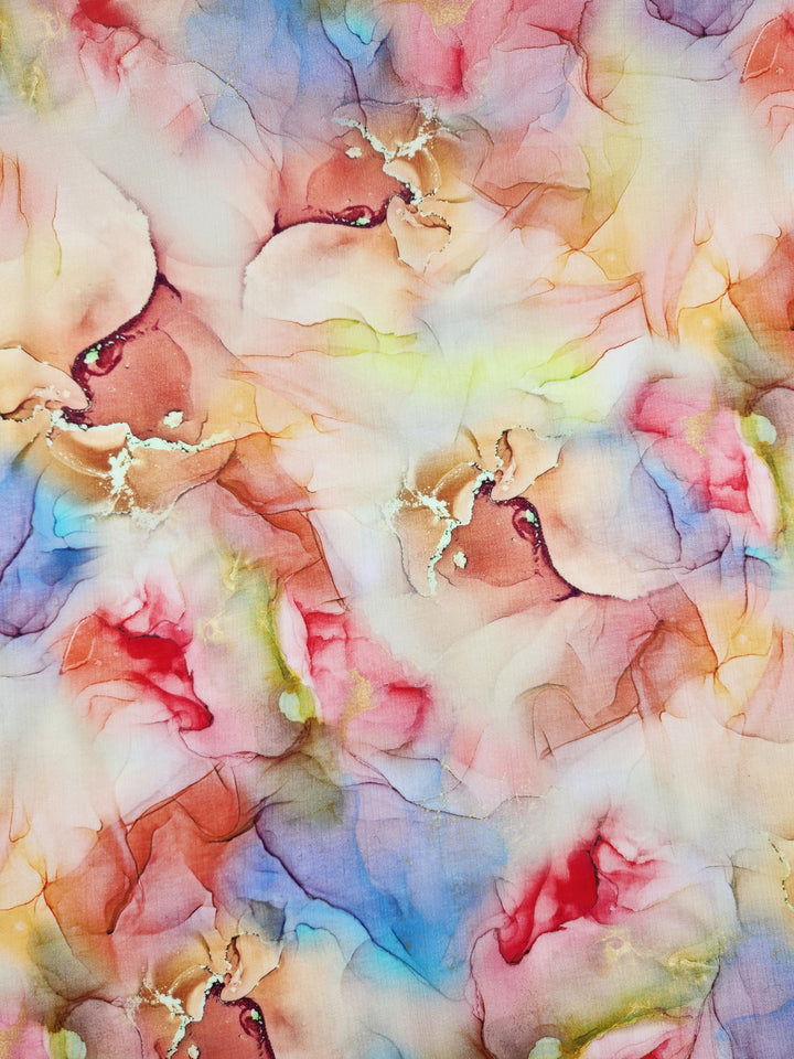 A colorful abstract painting that captures the fluid, organic essence reminiscent of Super Cheap Fabrics' Designer Cotton - Aurelia - 150cm, featuring swirling patterns in shades of pink, blue, yellow, and red that evoke marbled textures or watercolor blending.