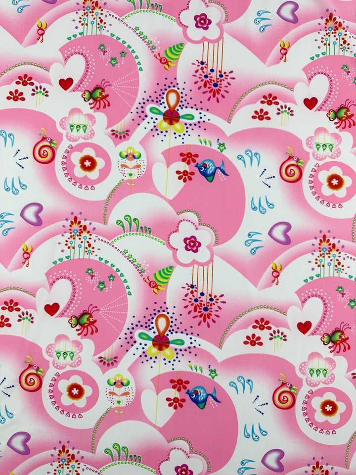 Introducing the Super Cheap Fabrics Printed Nylon Lycra - Anime - 158cm: a vibrant, whimsical pattern featuring pink hearts, flowers, and abstract shapes. The background is filled with an assortment of colorful elements like bees, birds, raindrops, and rainbows. Perfect for creating playful and lively swimwear with high-quality prints on soft fabric.